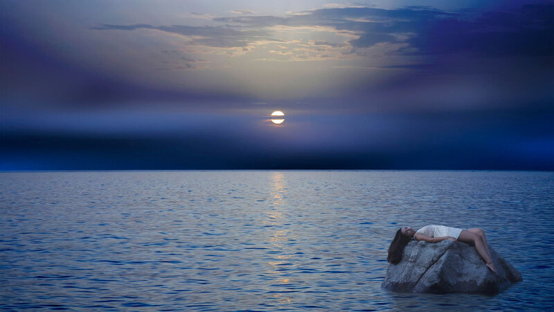 Woman Lying on Rock — Blue, Serene, Night