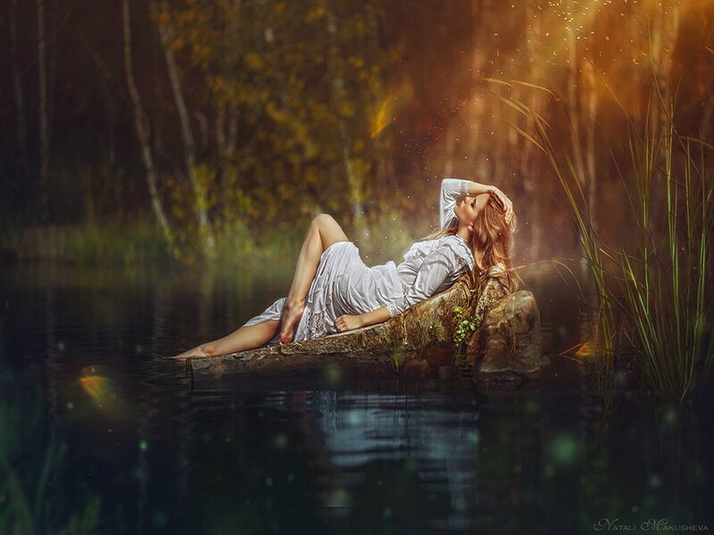 Woman Lying on Rock — White, Serene