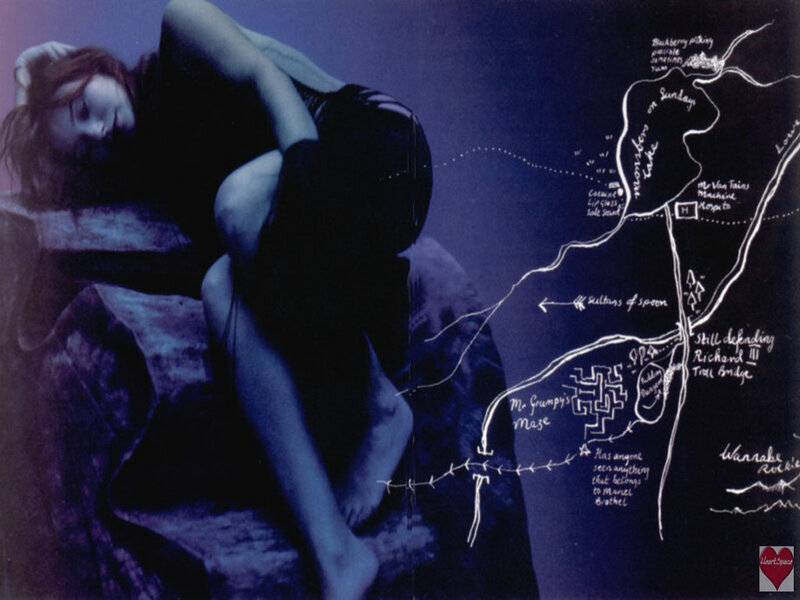 Woman Lying on Rocks — Blue