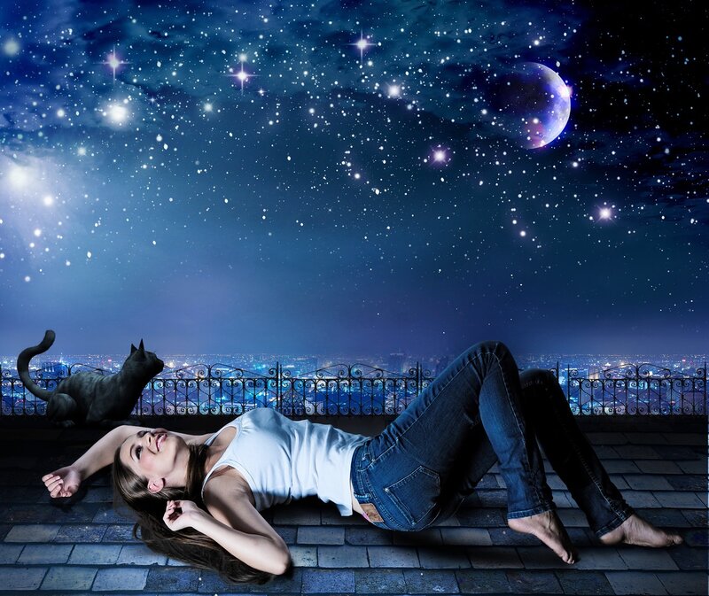 Woman Lying on Rooftop — Blue, Serene