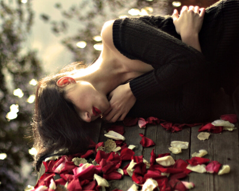Woman Lying on Rose Petals — Red, Dramatic, Afternoon