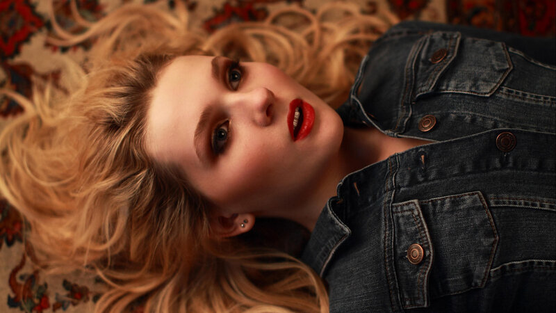 Woman Lying on Rug — Blue, Dramatic