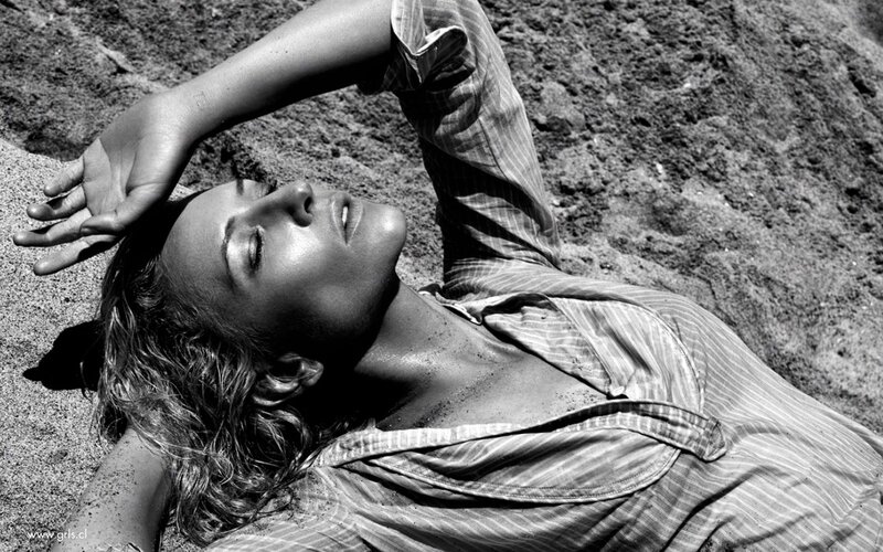 woman lying on sand