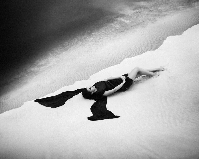 Woman Lying on Sand — Black, Dramatic