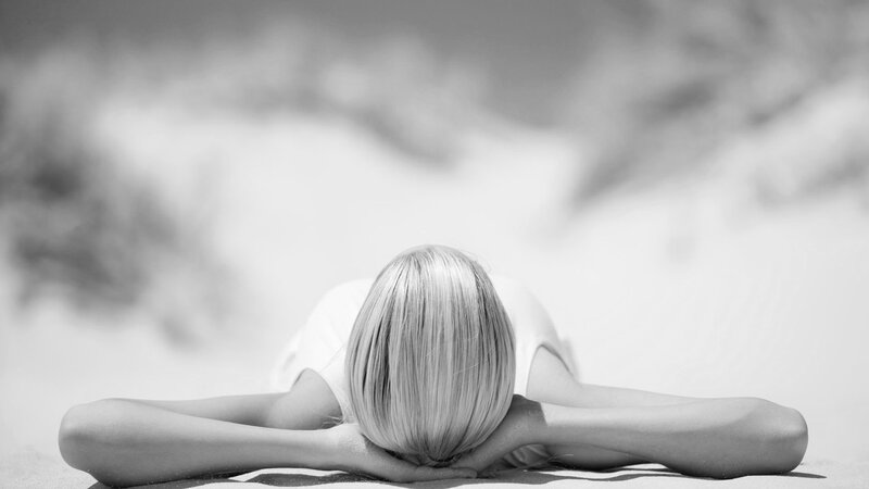Woman Lying on Sand — Black, Serene