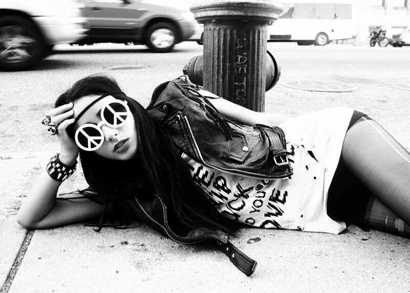 Woman Lying on Sidewalk