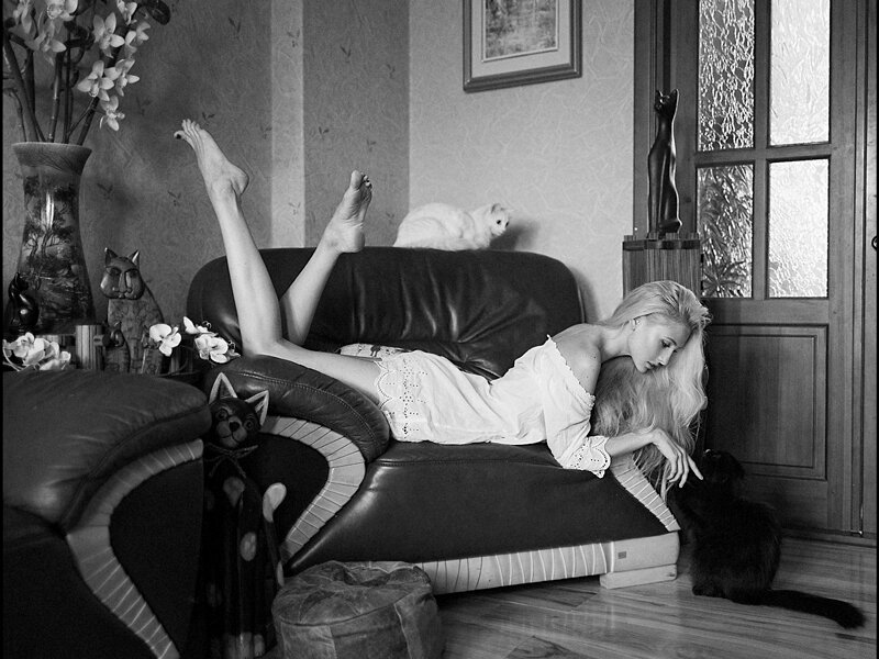 Woman Lying on Sofa — Black, Calm