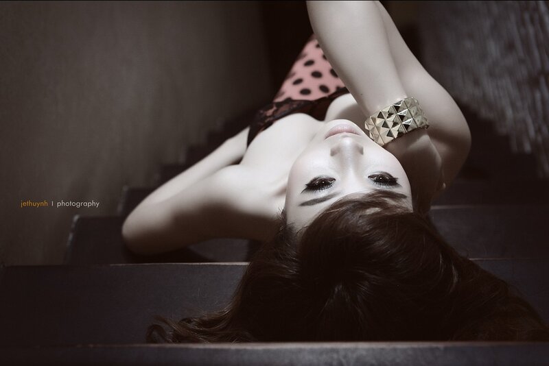 woman lying on stairs