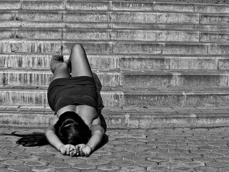 Woman Lying on Stairs — Black