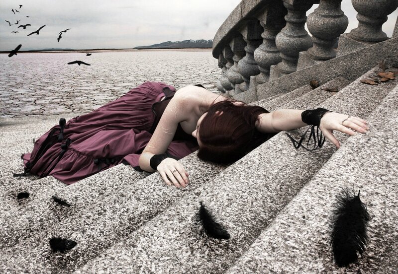Woman Lying on Steps — Gray, Dramatic, Photograph