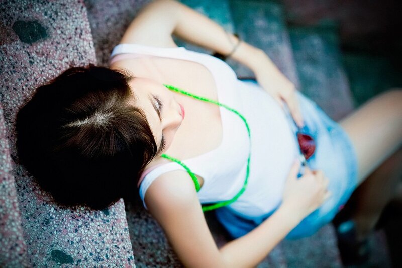 Woman lying on steps with injury