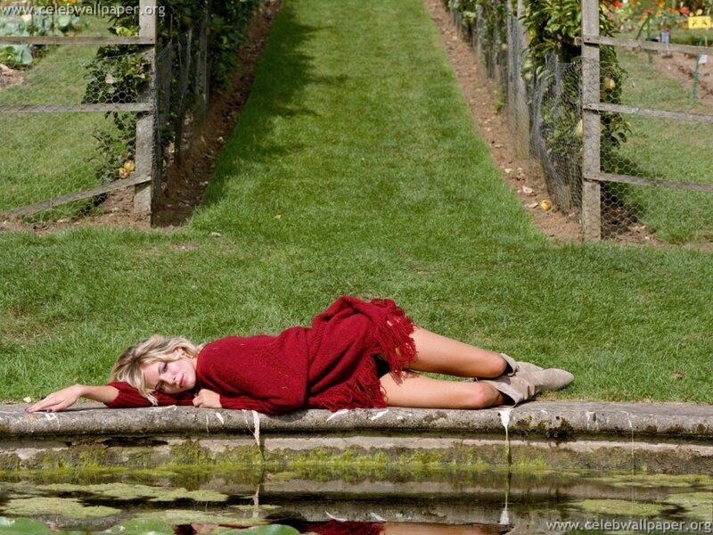 Woman Lying on Stone Edge