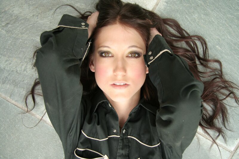 woman lying on stone floor