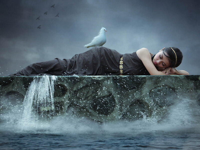 Woman Lying on Stone — Gray, Dramatic