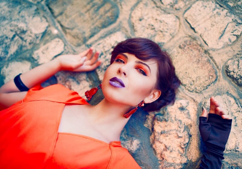 Woman Lying on Stone — Orange
