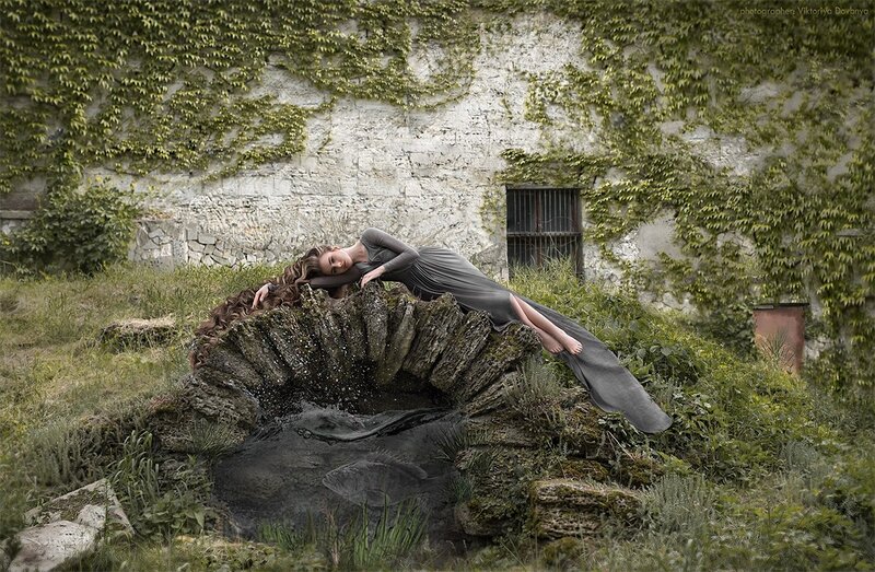 Woman Lying on Stone Well
