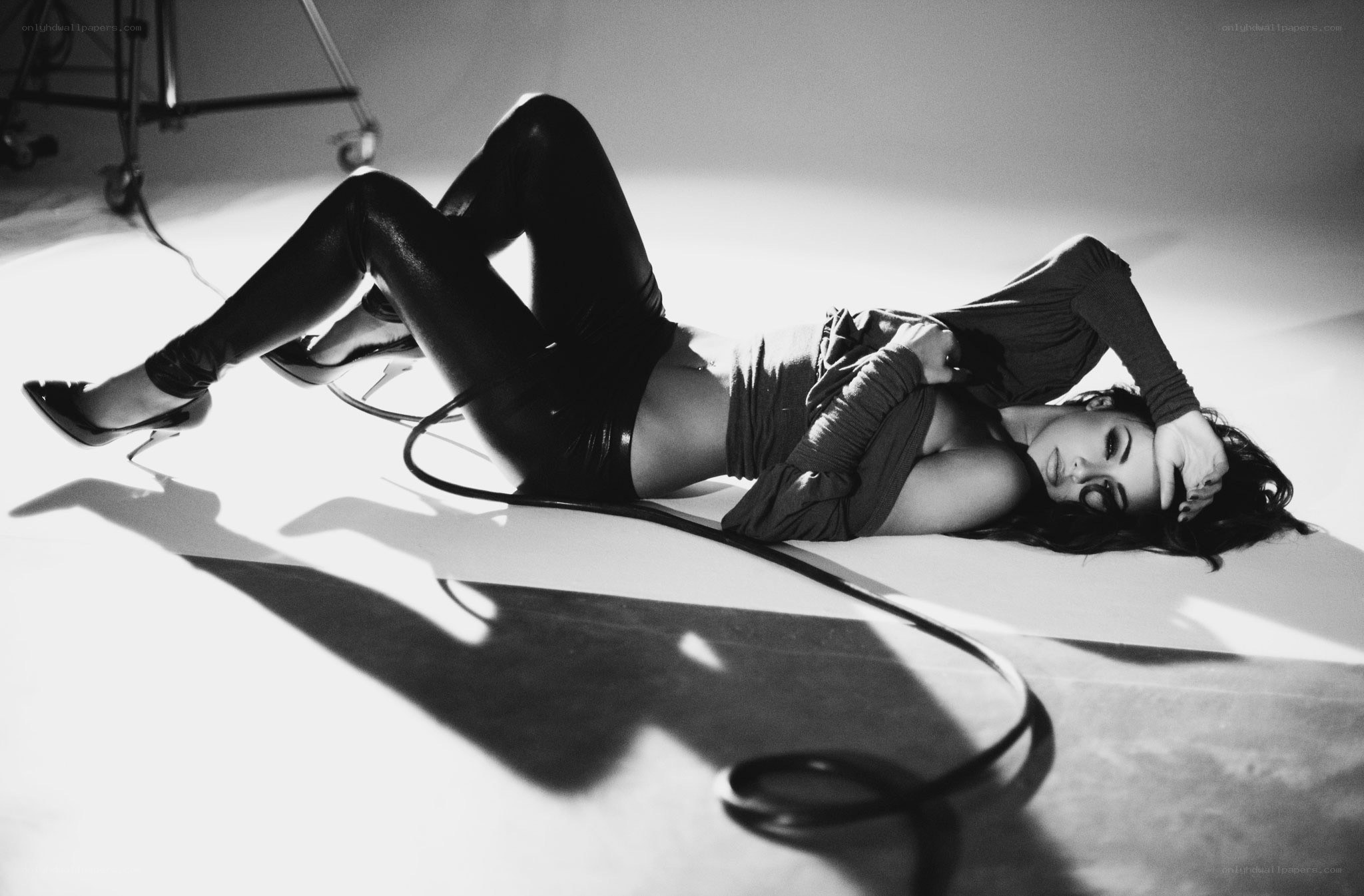woman lying on studio floor