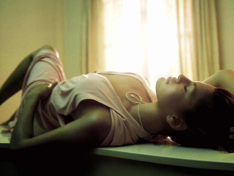 Woman Lying on Surface — White