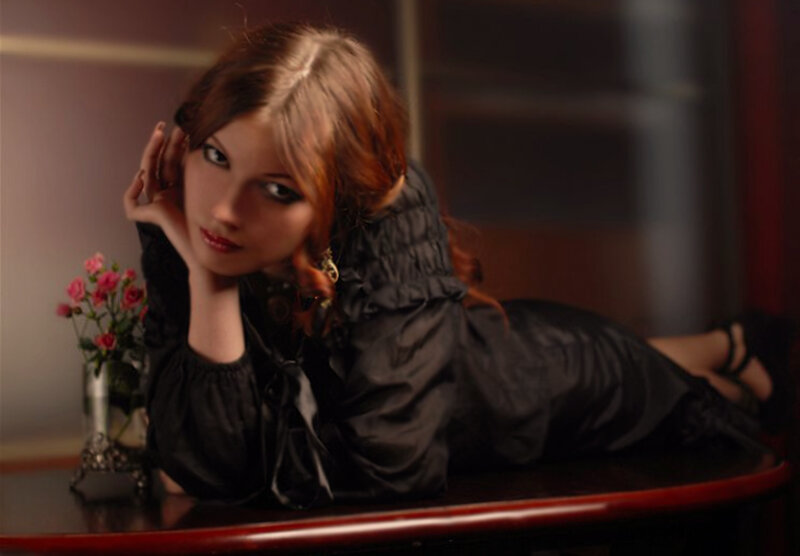 Woman Lying on Table — Black
