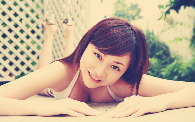 woman lying on table outdoors