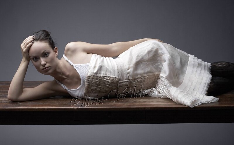 Woman Lying on Table — White, Dramatic