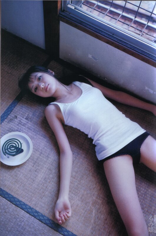 woman lying on tatami mat