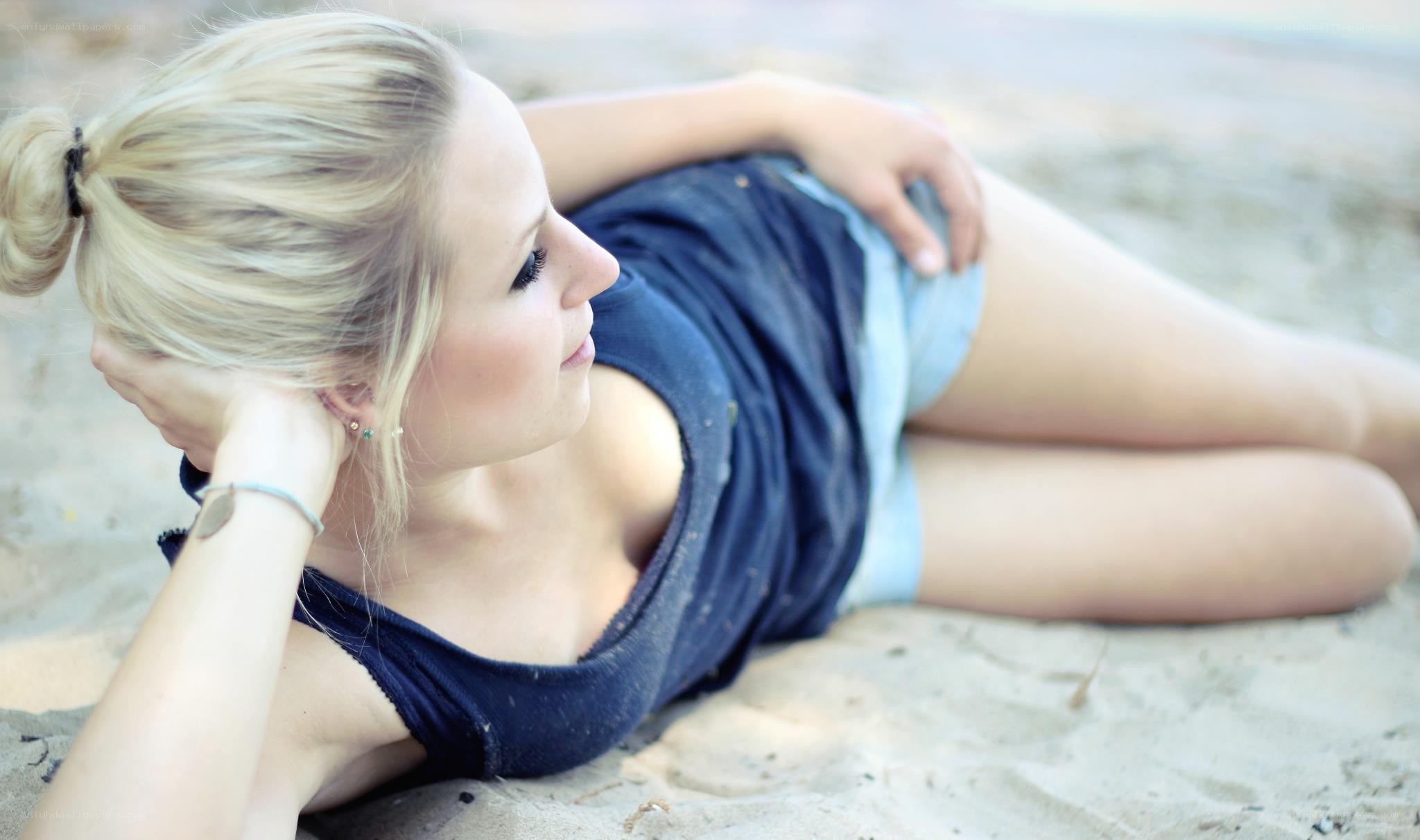 woman lying on the beach