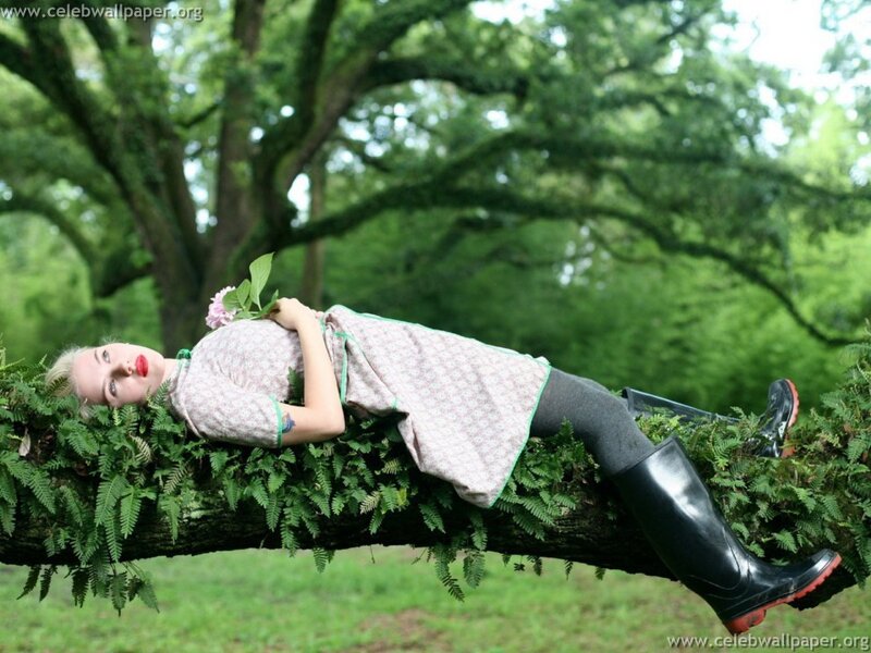 Woman Lying on Tree Branch — Green