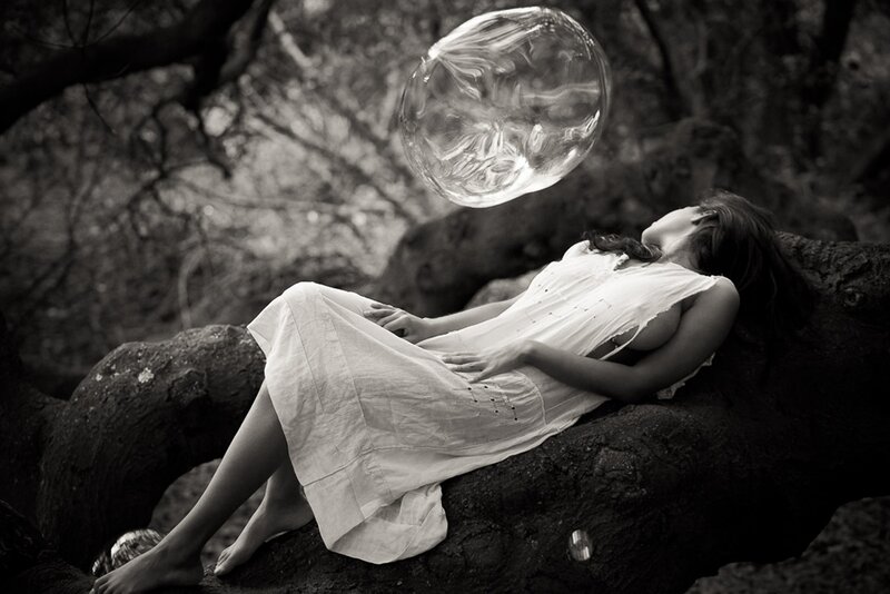 Woman Lying on Tree Trunk — Black