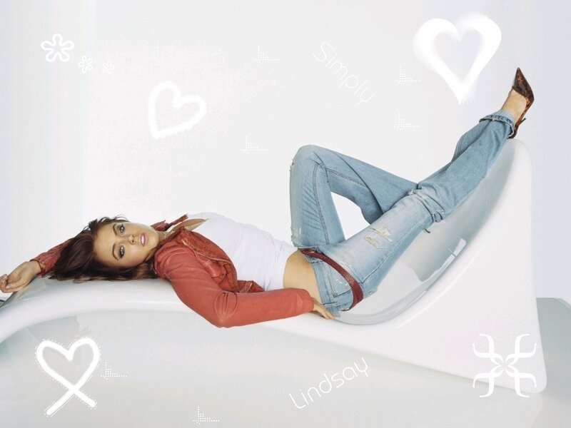 woman lying on white chaise