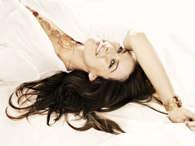 Woman Lying on White Fabric — Relaxed