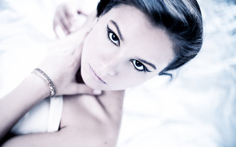 Woman Lying on White Surface — Calm, Photograph, Hands
