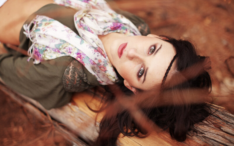 Woman Lying on Wood — Brown