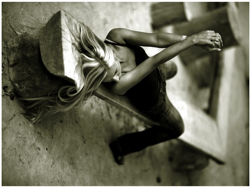 Woman Lying on Wooden Beam