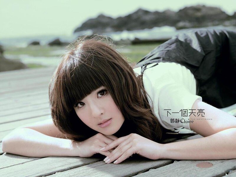 woman lying on wooden deck