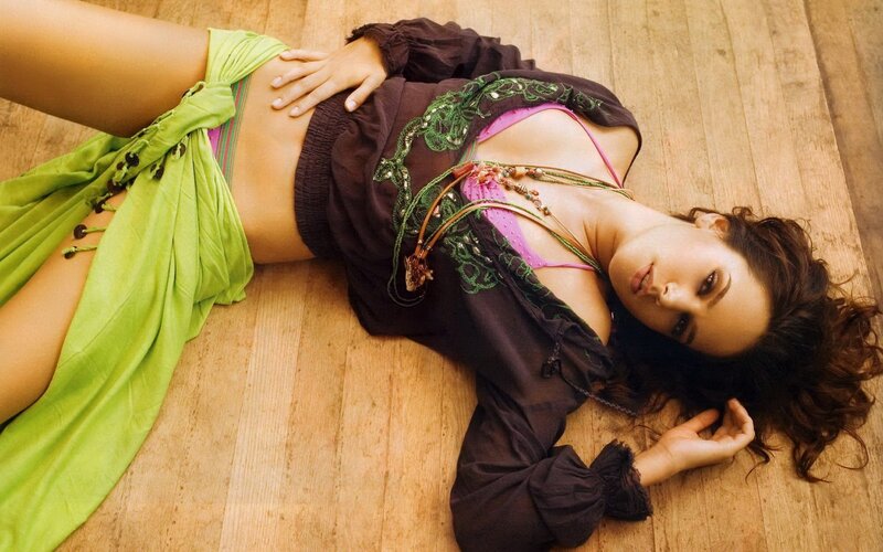 woman lying on wooden floor