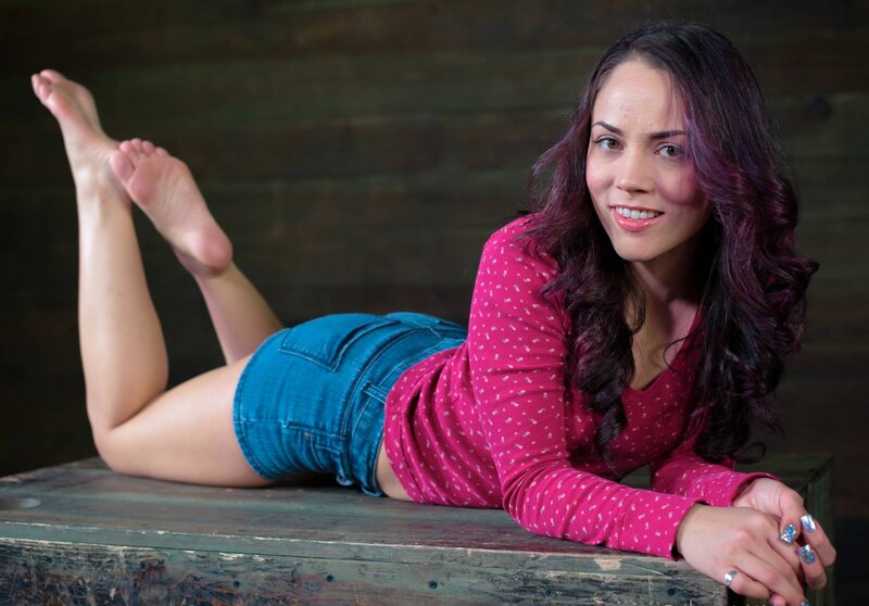 Woman Lying on Wooden Surface — Pink