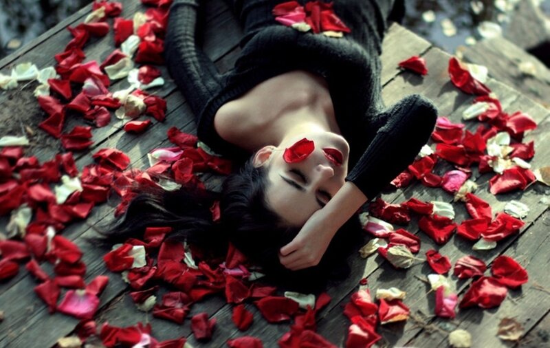 Woman Lying on Wooden Surface — Red