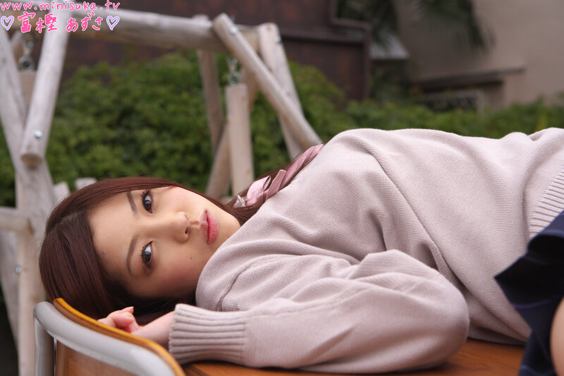 woman lying on wooden surface