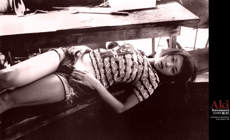 woman lying under a table