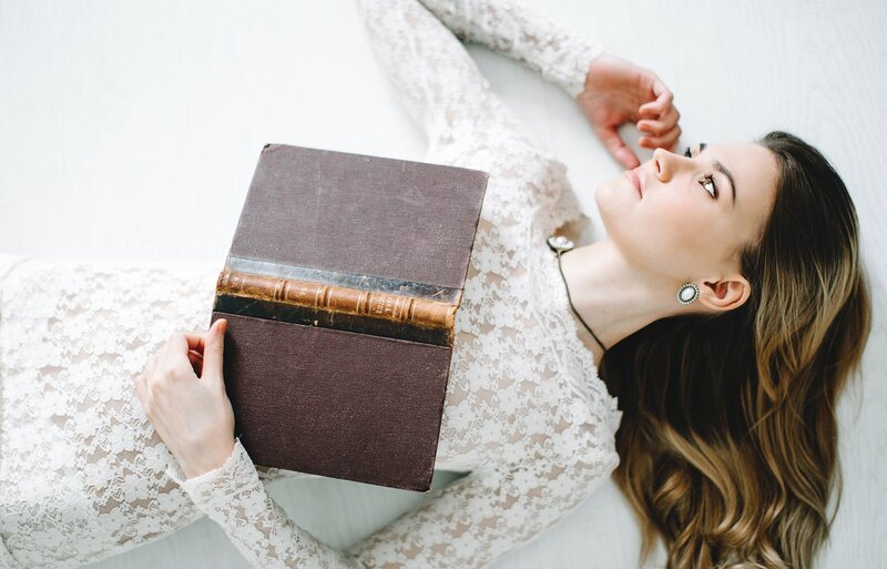 Woman Lying with Book