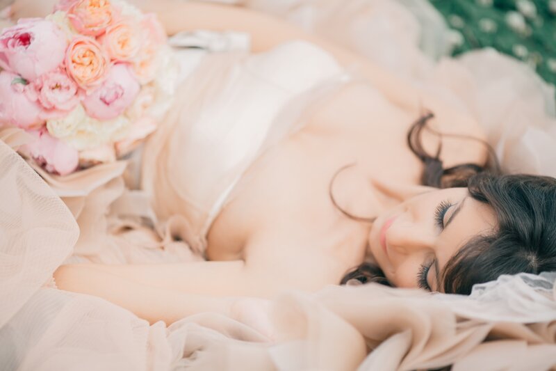 Woman Lying with Bouquet