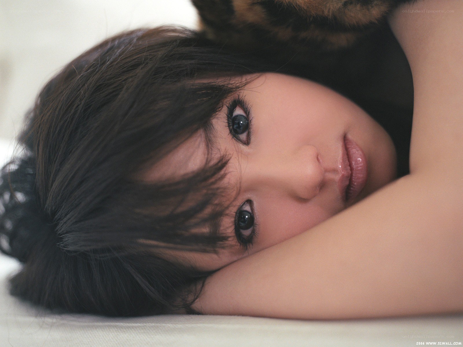 woman lying with cat