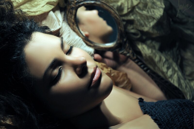 Woman Lying with Mirror