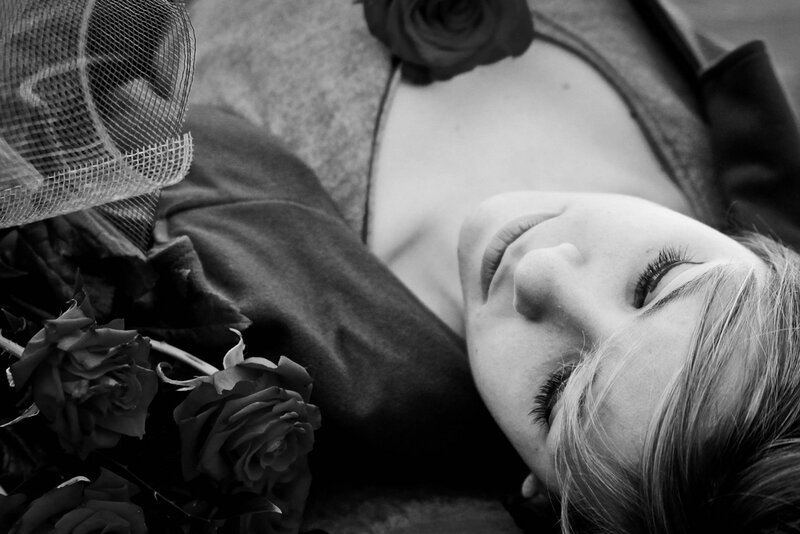 Woman Lying with Roses — Black, Serene