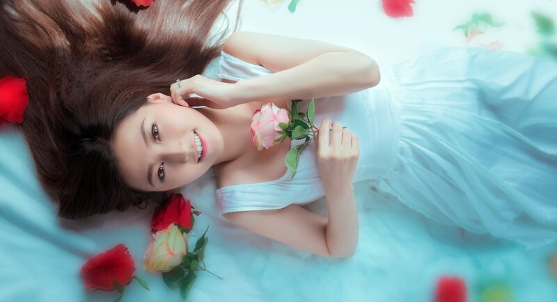 Woman Lying with Roses — White, Serene, Photograph, Dress