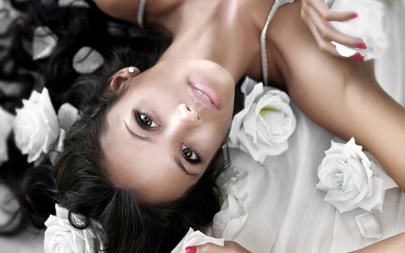 Woman Lying with Roses — White, Serene