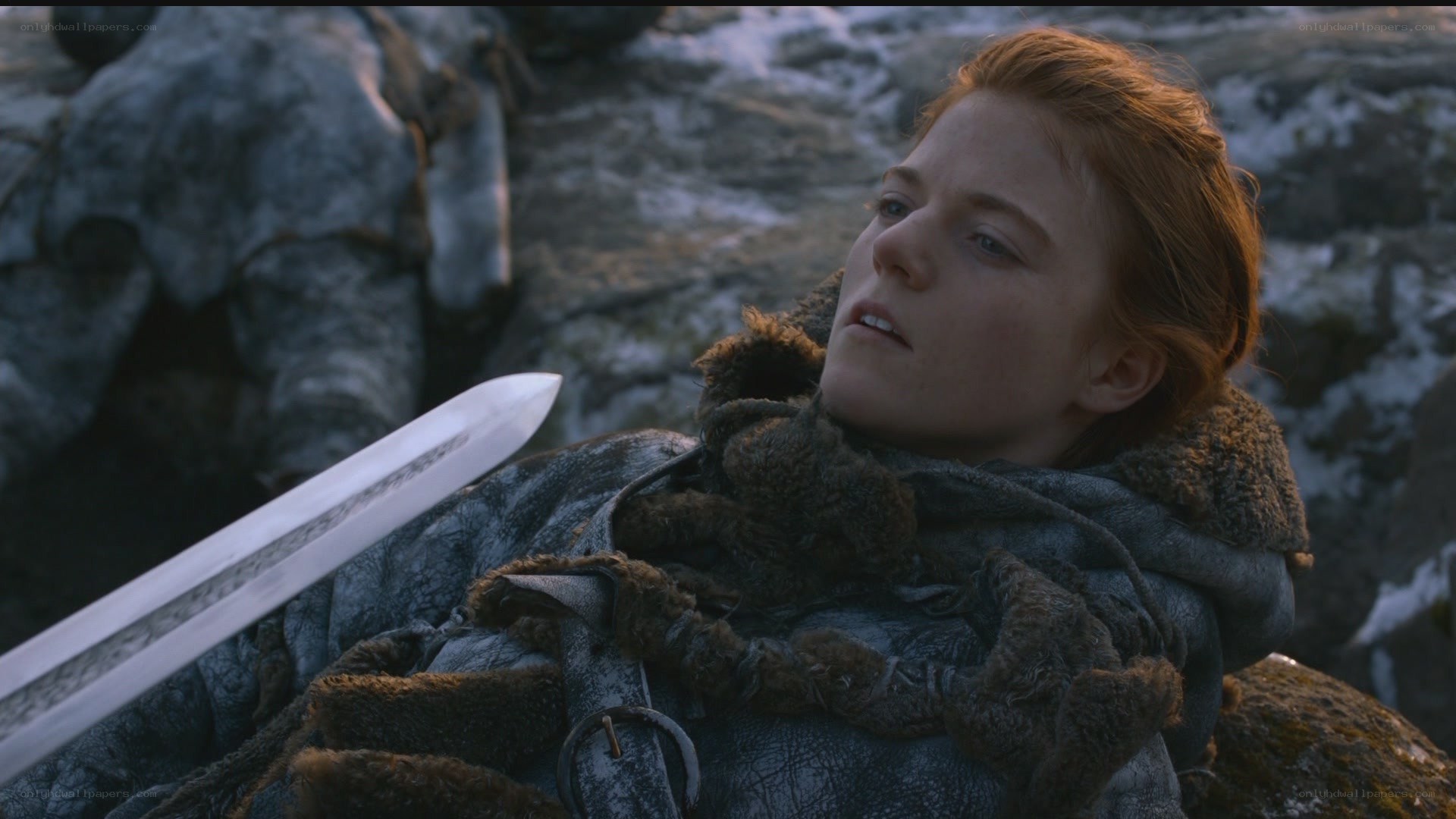 woman lying with sword