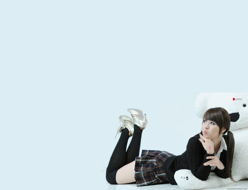 woman lying with teddy bear