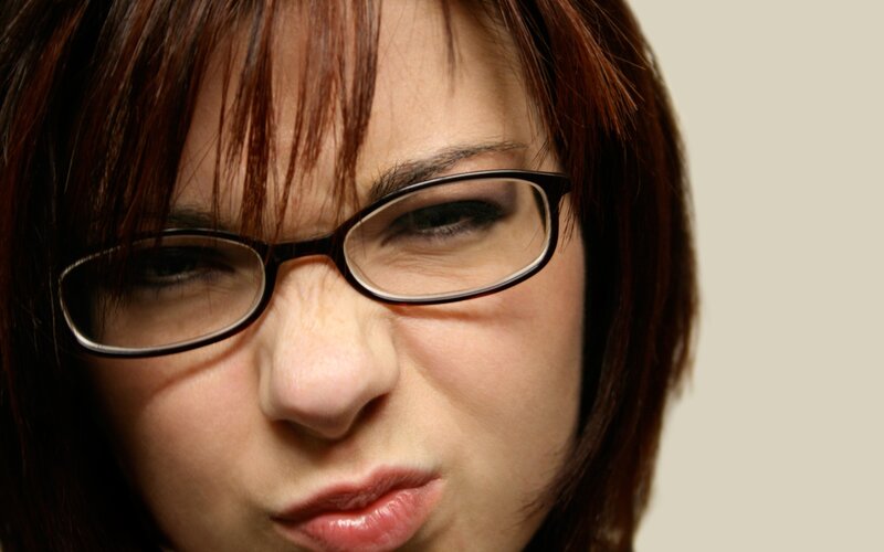 woman making a face with glasses